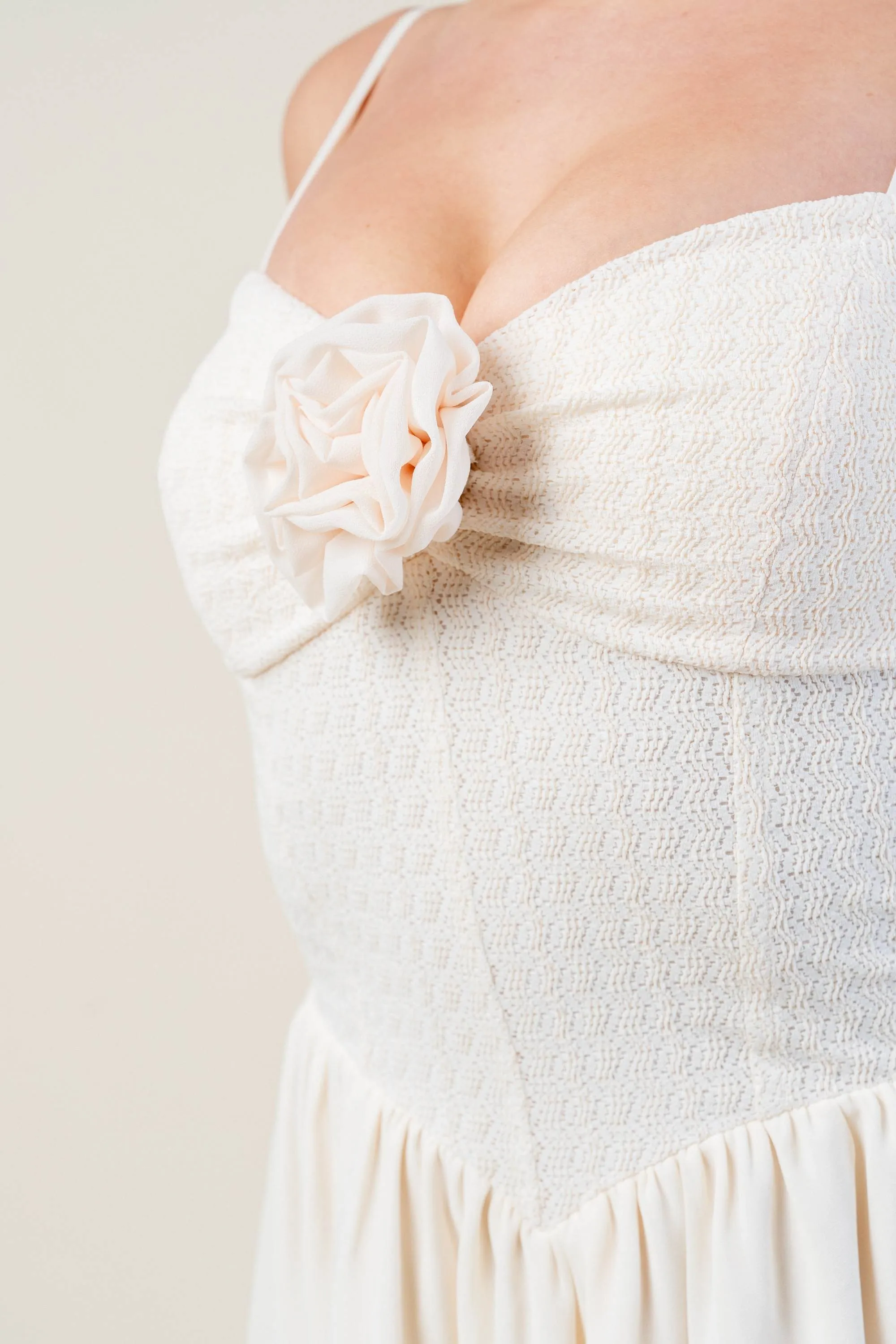 STRETCH KNIT NOVELTY ROSETTE SKATER MINI DRESS