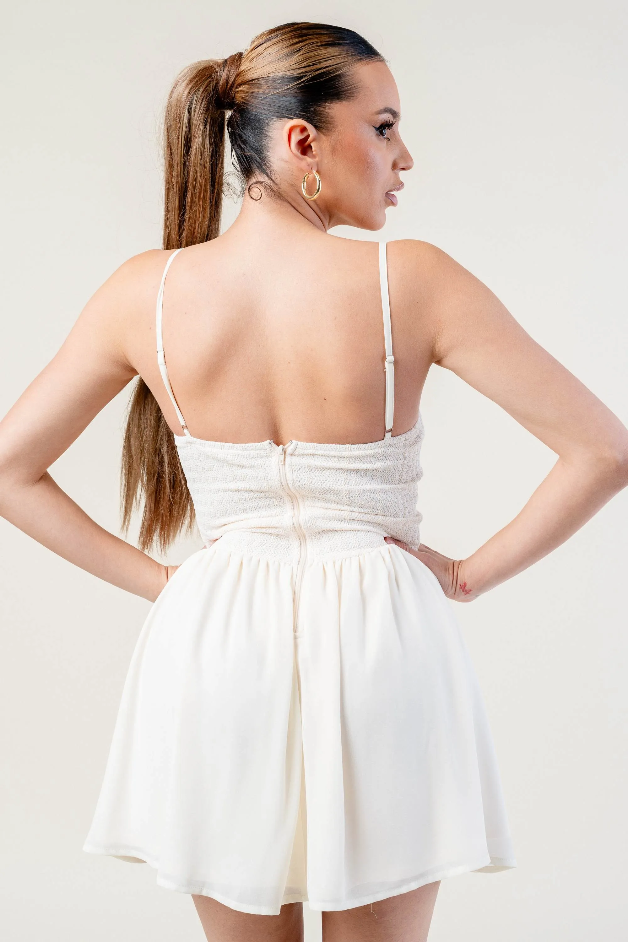 STRETCH KNIT NOVELTY ROSETTE SKATER MINI DRESS